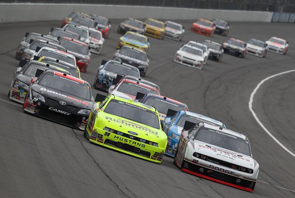 Joey Logano, Paul Menard and Brad Keselowski lead the field on a restart during Saturday’s race, which only had two cautions for nine laps and featured 11 lead changes among seven drivers. Credit: Jonathan Daniel/Getty Images